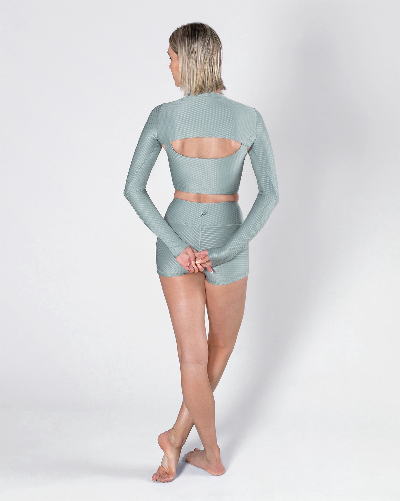 Kela Shrug